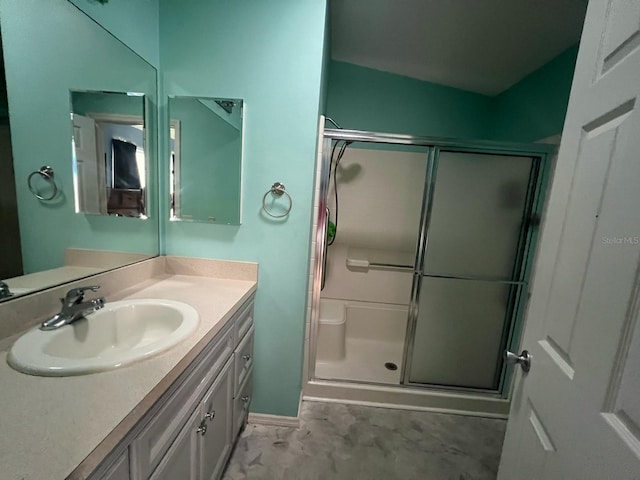 bathroom featuring vanity and walk in shower