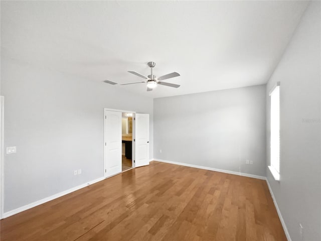 unfurnished bedroom with hardwood / wood-style flooring and ceiling fan