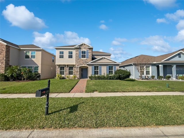 front facade with a front lawn