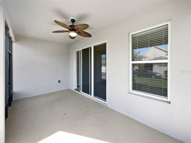 view of patio with ceiling fan