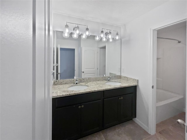 bathroom featuring vanity and shower / tub combination