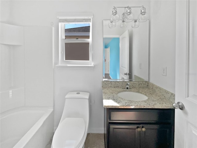 bathroom featuring vanity and toilet