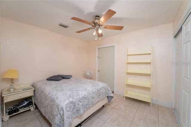 bedroom featuring a closet and ceiling fan