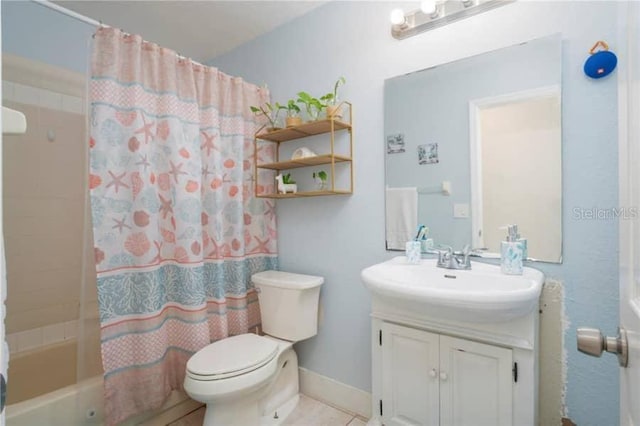 full bathroom featuring vanity, shower / bath combination with curtain, and toilet