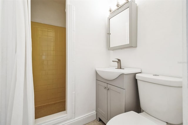 bathroom with vanity, a shower with curtain, and toilet