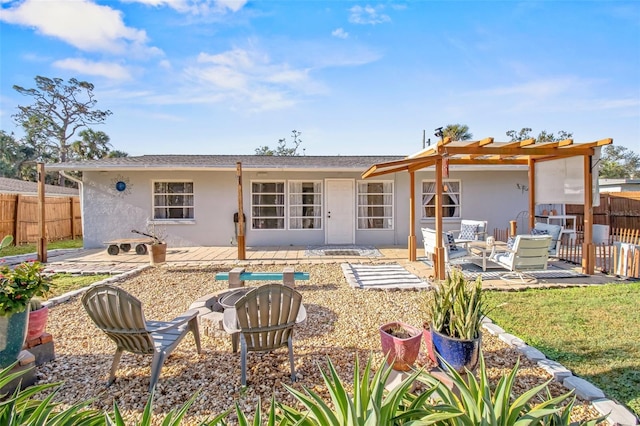 back of house with a patio