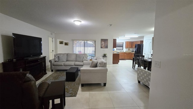 living room with light tile patterned floors