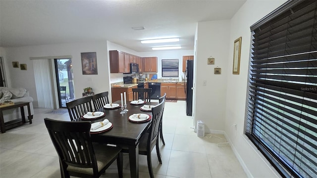 view of tiled dining space