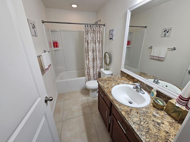 full bathroom with vanity, tile patterned flooring, toilet, and shower / bath combo with shower curtain