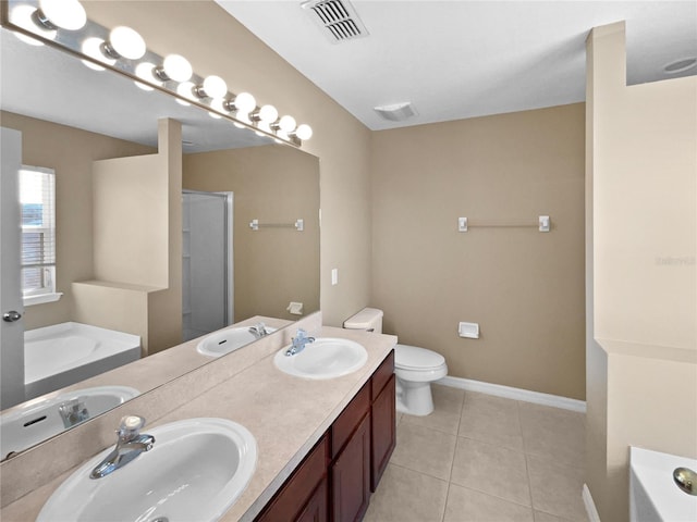 full bathroom featuring tile patterned floors, toilet, separate shower and tub, and vanity