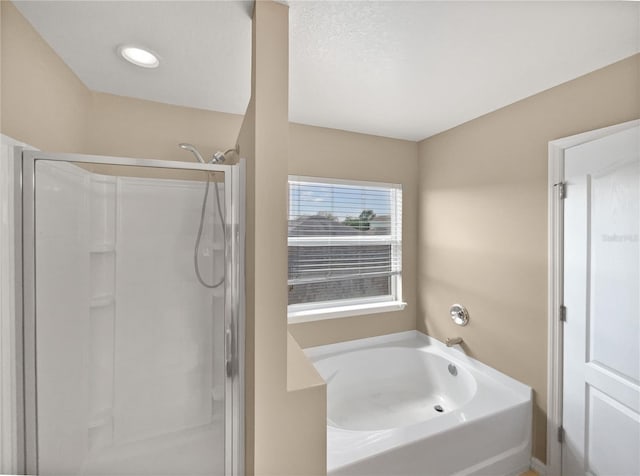 bathroom with independent shower and bath