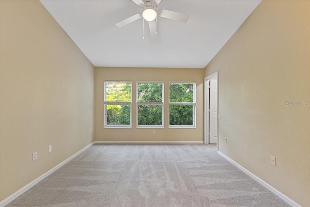 6912 Hochad Dr, Orlando, FL 32819 - carpeted spare room with a ceiling fan and lofted ceiling