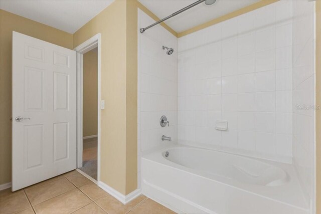 6912 Hochad Dr, Orlando, FL 32819 - bathroom featuring tile patterned flooring and bathtub / shower combination