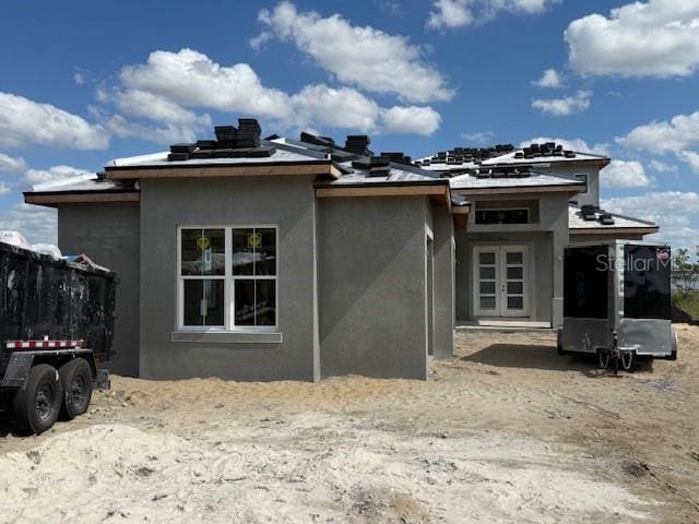 rear view of house with solar panels