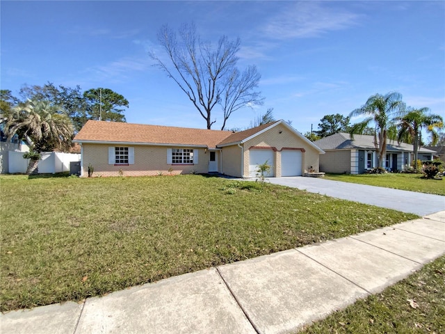 ranch-style house with a garage and a front lawn