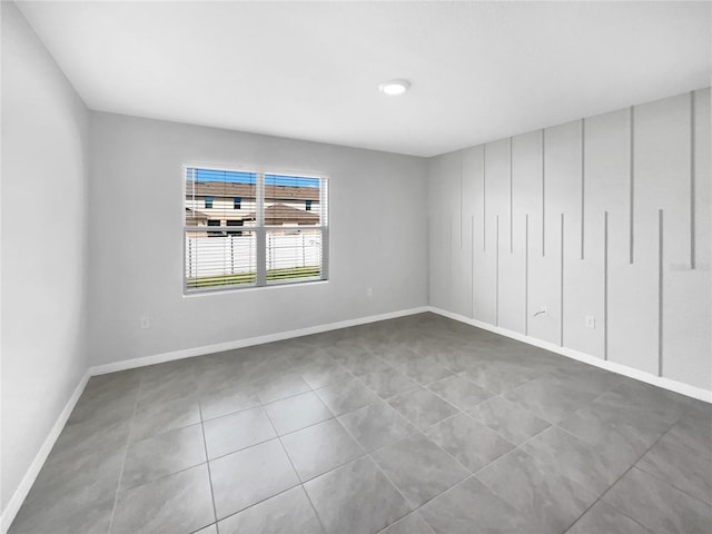 view of tiled spare room