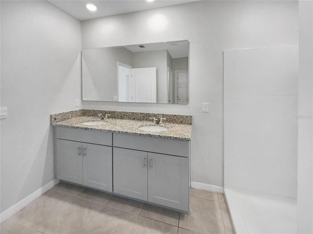 bathroom featuring vanity and tile patterned floors