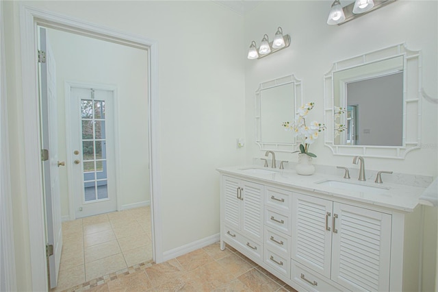 bathroom with vanity and tile patterned flooring