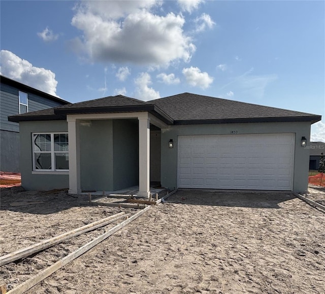 view of front of house with a garage