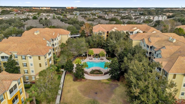 birds eye view of property with a residential view