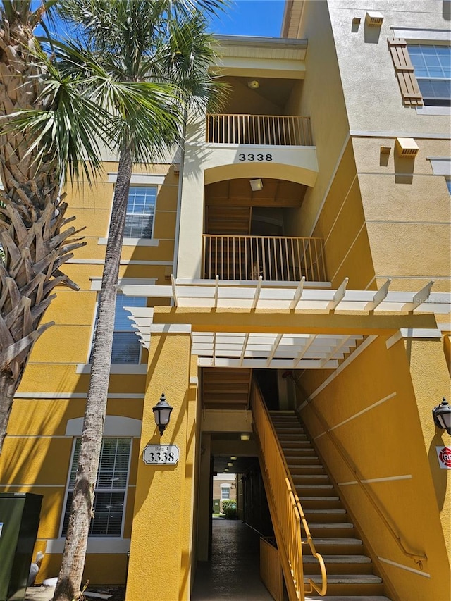 view of property with stairway