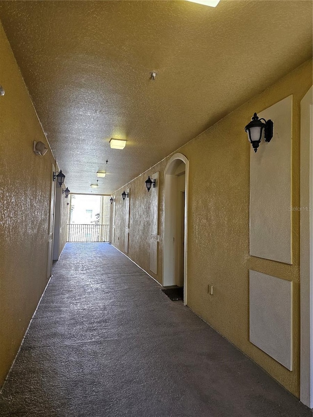 3338 Robert Trent Jones Dr Unit 20804, Orlando, FL 32835 - corridor featuring arched walkways