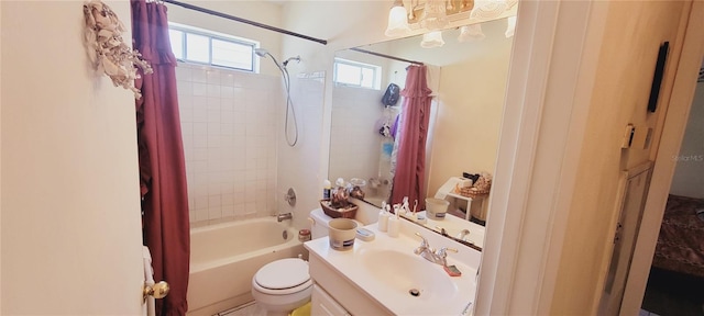 full bathroom featuring vanity, shower / bathtub combination with curtain, and toilet