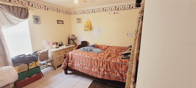 bedroom with light tile patterned floors