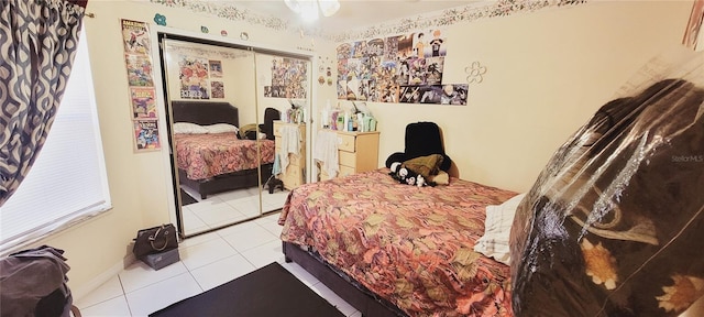 bedroom featuring light tile patterned floors