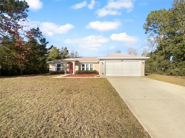 single story home featuring a garage and a front lawn