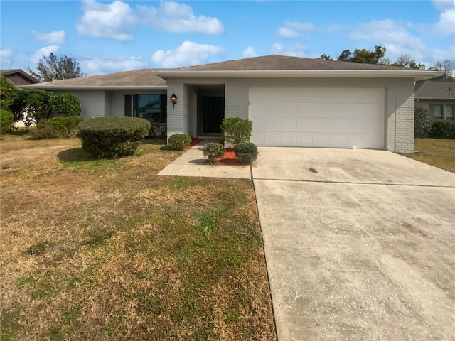 3402 Rankin Dr, New Port Richey, FL 34655 - single story home with a garage and a front lawn