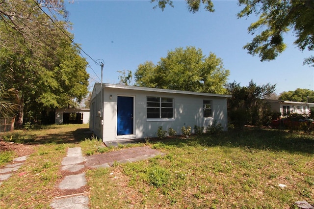 exterior space featuring a lawn