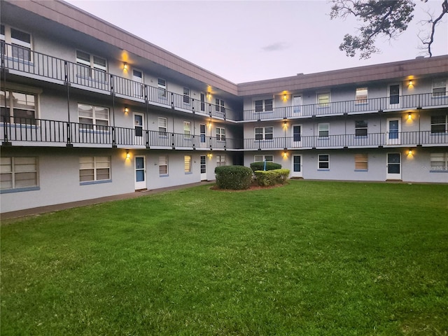 view of outdoor building at dusk