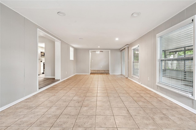 353 E Orange St, Altamonte Springs, FL 32701 - empty room with light tile patterned floors and ceiling fan