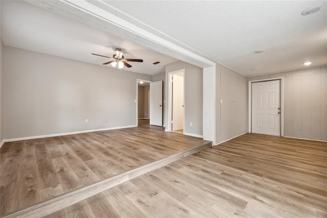353 E Orange St, Altamonte Springs, FL 32701 - unfurnished room featuring ceiling fan, light hardwood / wood-style flooring, and a textured ceiling