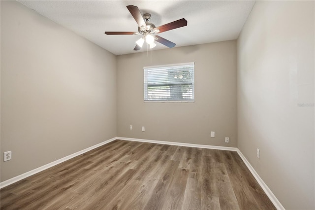 353 E Orange St, Altamonte Springs, FL 32701 - empty room with hardwood / wood-style floors and ceiling fan