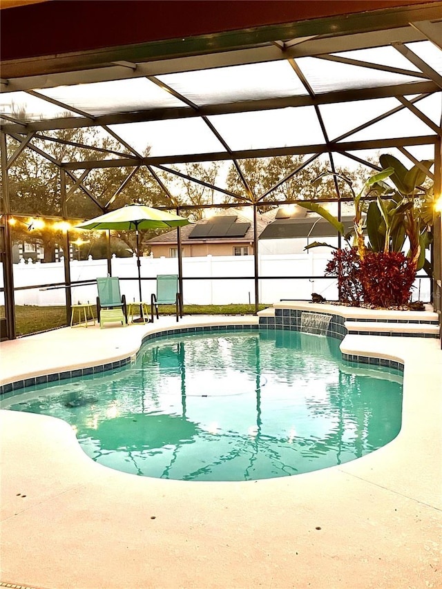 view of pool featuring a patio and a lanai