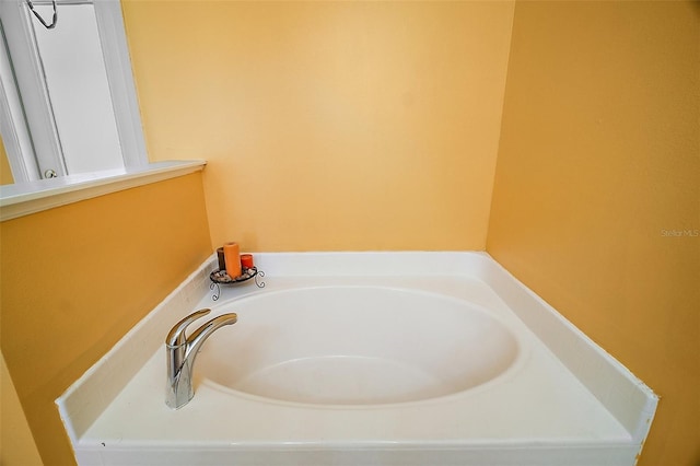 bathroom with a tub