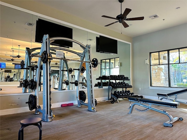 workout area featuring ceiling fan