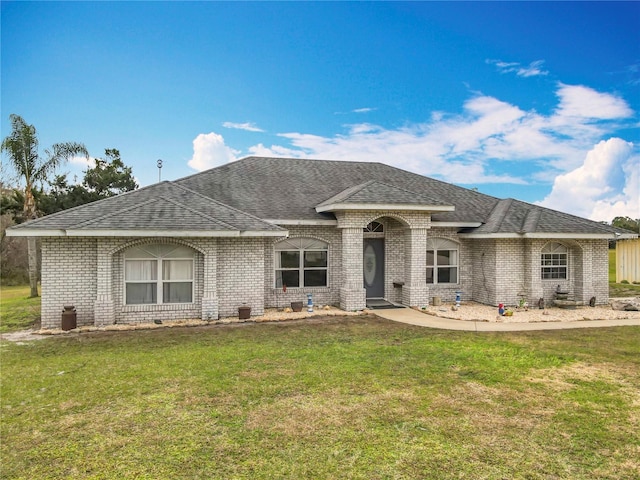 view of front of house with a front lawn