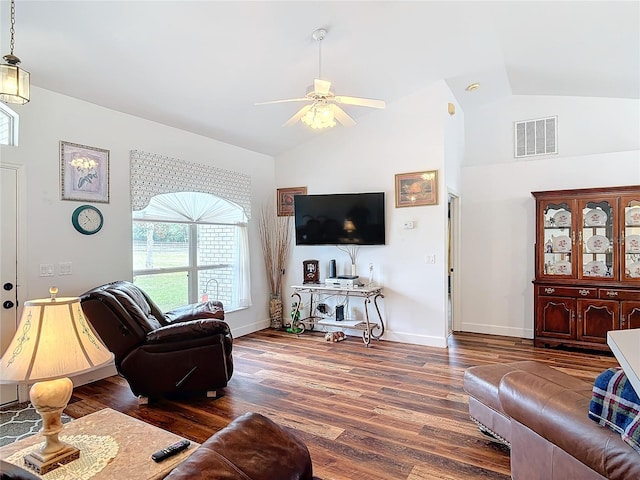 living room featuring dark wood-type flooring, ceiling fan, and lofted ceiling