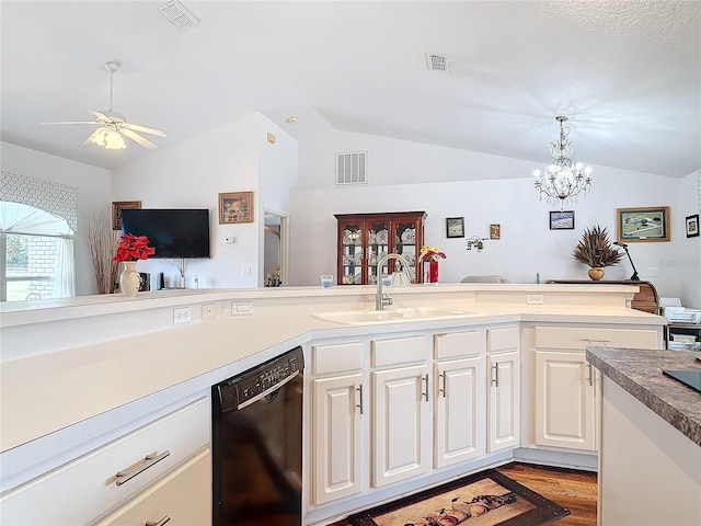 kitchen with vaulted ceiling, dishwasher, sink, ceiling fan, and light hardwood / wood-style flooring