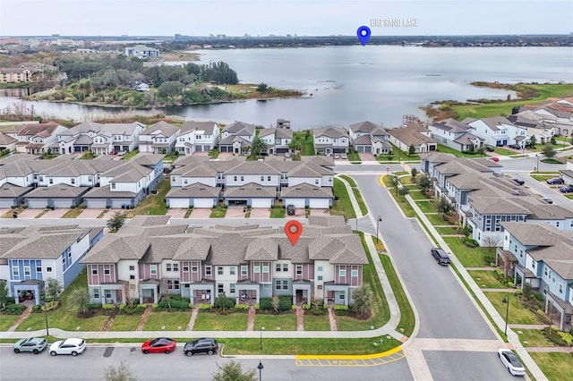 bird's eye view with a water view