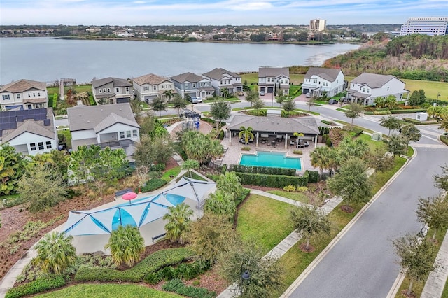 birds eye view of property featuring a water view