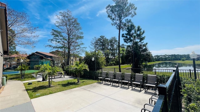 view of patio featuring a water view