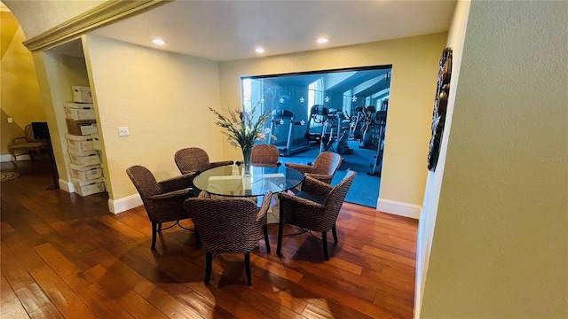 dining space featuring dark hardwood / wood-style flooring