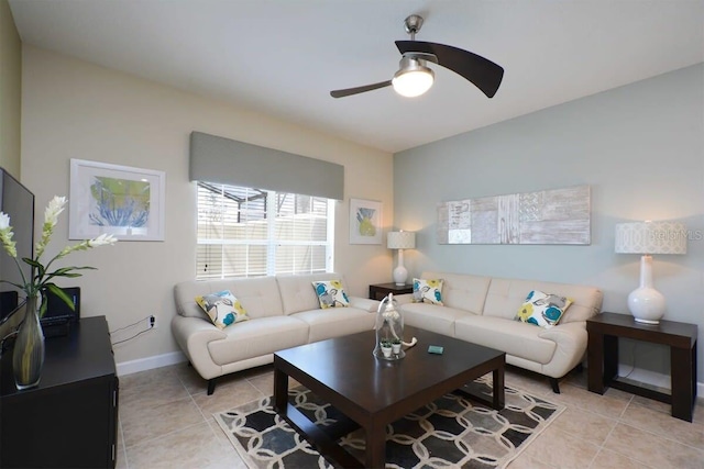 tiled living room with ceiling fan