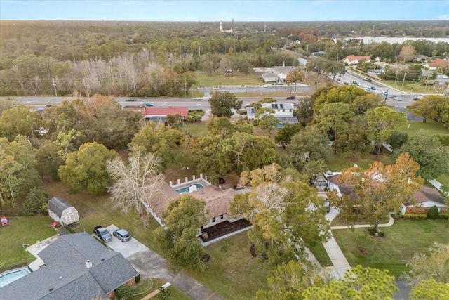 bird's eye view featuring a forest view