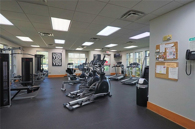gym with a drop ceiling
