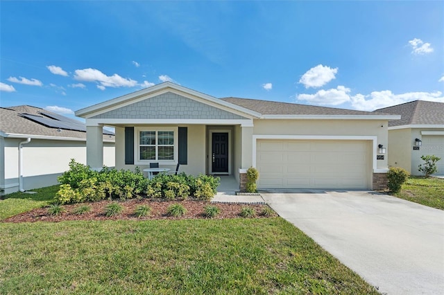 view of front of property featuring stucco siding, concrete driveway, covered porch, a garage, and a front lawn